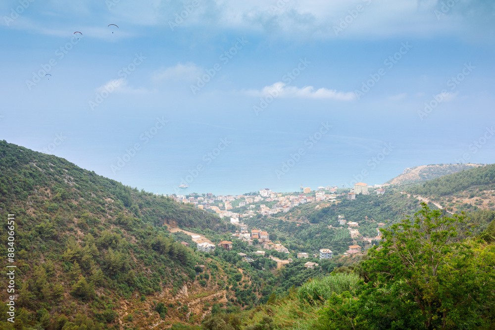 Naklejka premium Panoramic view of blue sea and sky on Alanya coastline. Landscape view of Mediterranean coast, Alanya, Turkey. High quality photo