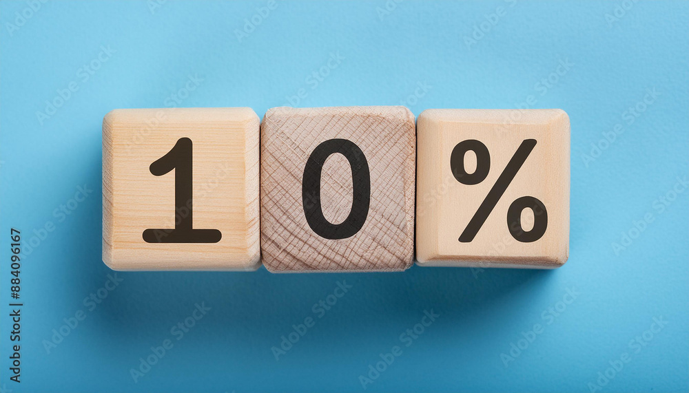 Wooden cubes with text 10% on isolated blue backdrop. Wood blocks, ten percent. Close-up. Flat lay Wooden cubes with text 10% on isolated blue backdrop. Wood blocks, ten percent. Close-up. Flat lay