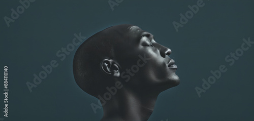 Conceptual depiction of a believing person, head turned towards heaven, radiating inner peace, calm equilibrium and hope