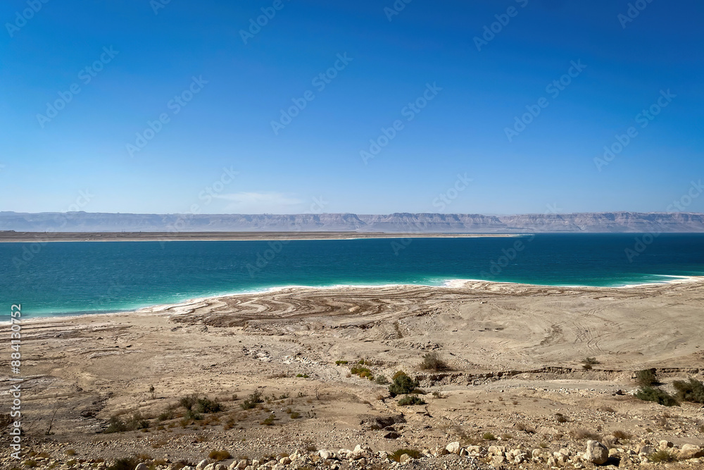 Scenic view of Dead Sea seen from Jordan looking towards Westbank against blue sky