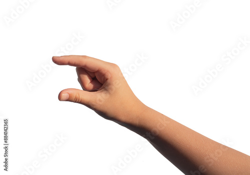 Billede på lærred Kids hand holding something invisible, empty space between two fingers, isolated on white background