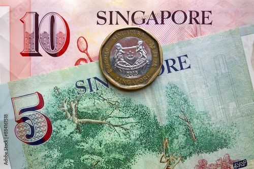 Singaporian dollar coin and banknotes photo