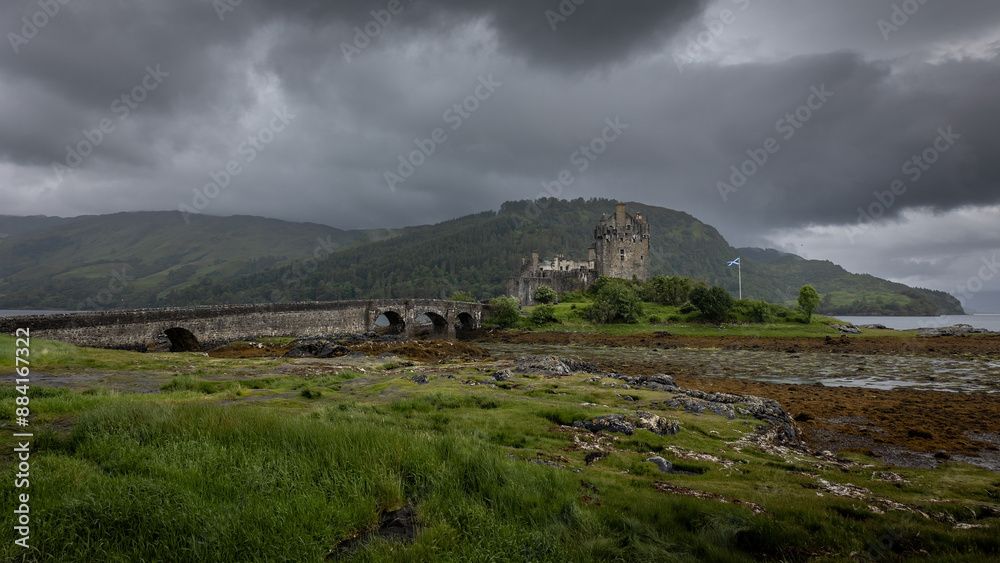 Eilean Donan a small tidal island with castle, connected by footbridge to the mainland in the Western Highlands of Scotland Eilean Donan a small tidal island with castle, connected by footbridge to the mainland in the Western Highlands of Scotland