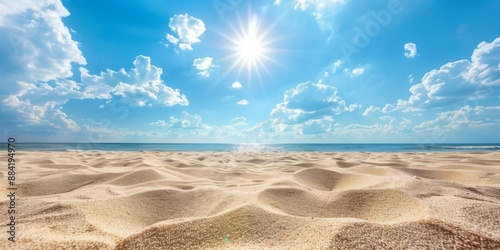 Close-up of beach sand against the background of the sea on a sunny bright summer day photo