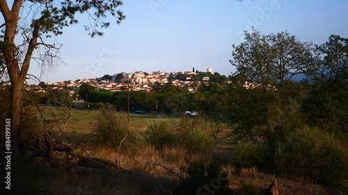 View of a small town from afar, cozy, evening, French village, Villeneuve de la Raho, commune, houses, Europe, nature around, atmospheric