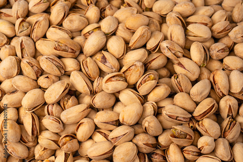 Tasty pistachios isolated on a white background. Tasty pistachios isolated on a white background.