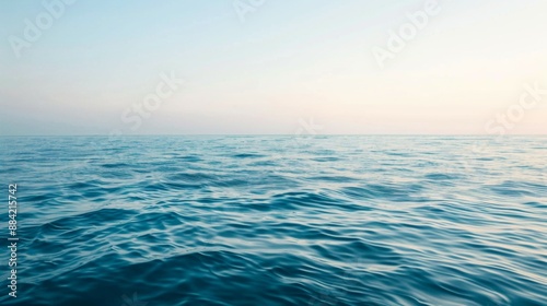 Wallpaper Mural A stunning vista of a vast, calm ocean with gentle, soothing waves and a clear sky above, embodying peace, serenity, and the boundless beauty of nature. Torontodigital.ca