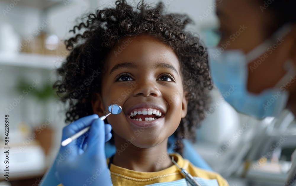 A young girl smiles broadly as a dentist examines her teeth with a mirror. A young girl smiles broadly as a dentist examines her teeth with a mirror.