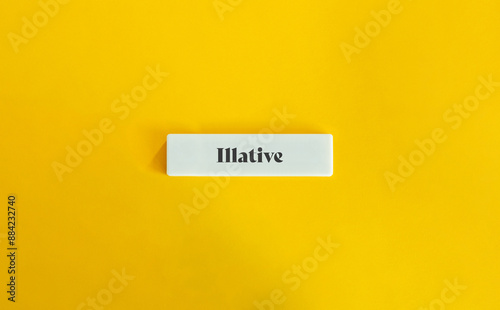 Illative Case. Text on Block Letter Tile on Yellow Background. Minimalist Aesthetics. photo