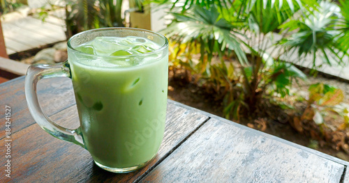 Fresh matcha latte iced tea drink at the cafe