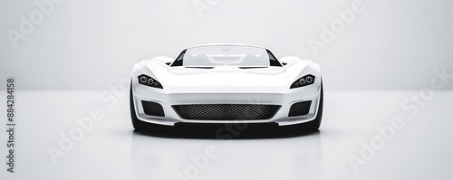 A white sports car on a white floor with a white background