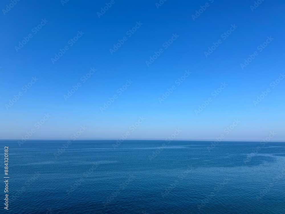 Blue sea calm water and clear sky Blue sea calm water and clear sky