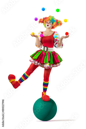 Canvastavla Funny juggler female clown juggling balls in the circus, woman entertainer as Joker in suit and wig, with clown whiteface makeup
