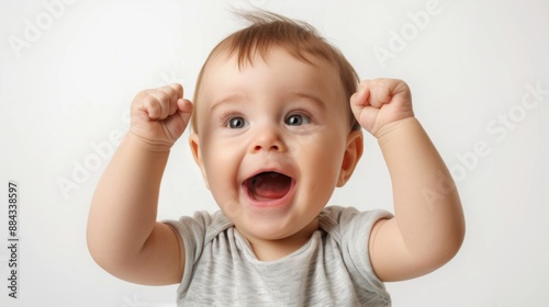  A cute baby's delighted expression against a white backdrop, capturing the joy of discovery. 