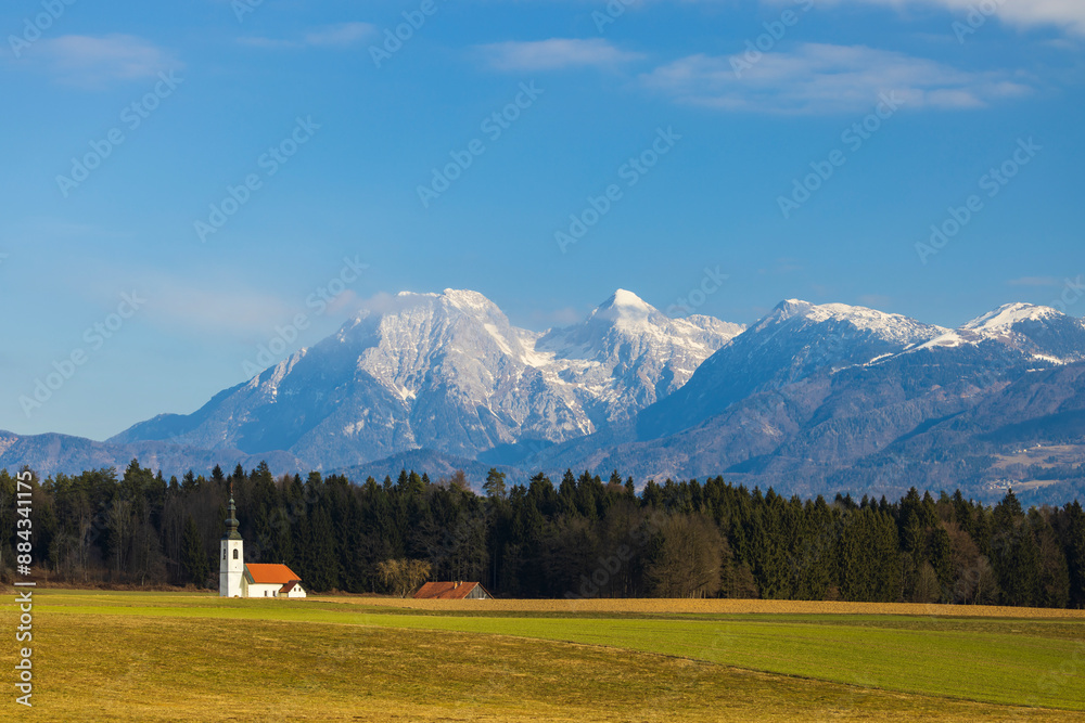 Fototapeta premium Landscape with church near Kranj, Slovenia