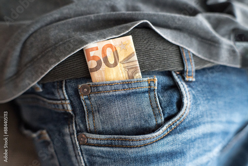 Obraz na płótnie Euro, money in jeans pocket. Savings for a rainy day.
w salonie