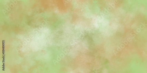 colorful watercolor background of abstract sunset sky with puffy clouds in bright green and blue color design. Abstract colorful and soft sweet grunge texture background with green orange or yellow co