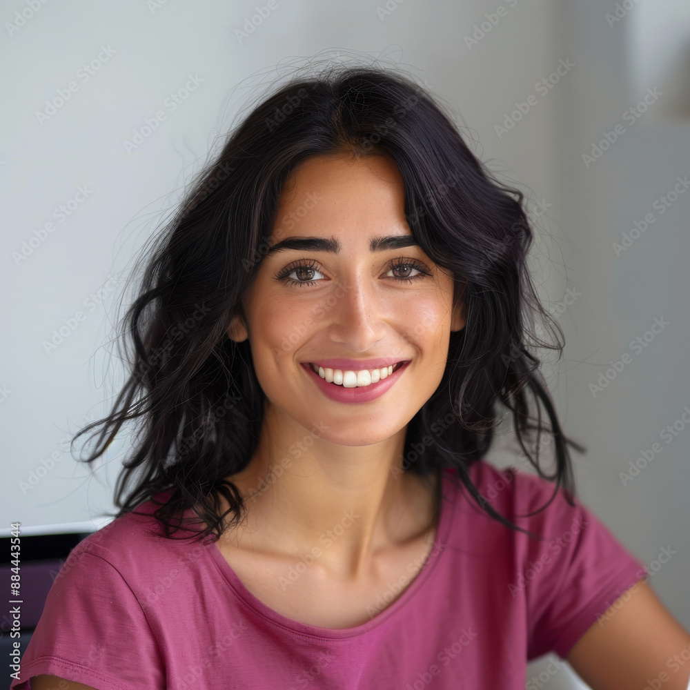 Fototapeta premium Gorgeous Woman in Dark Pink T-Shirt Working on Laptop