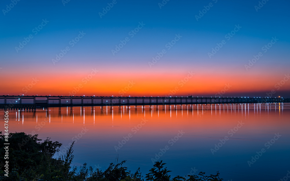 Landscape view of gloomy sunset over the Koshi river in Nepal. Landscape view of gloomy sunset over the Koshi river in Nepal.