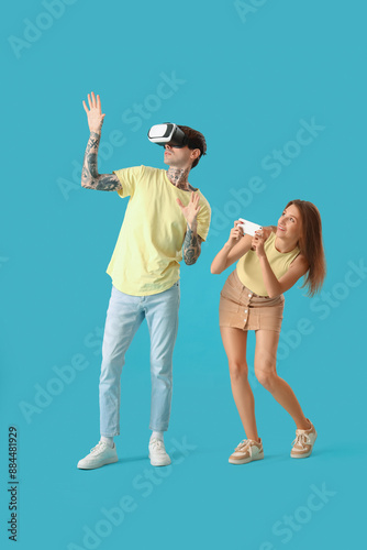 Young couple with VR glasse...