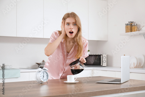 Hurrying young woman with l...