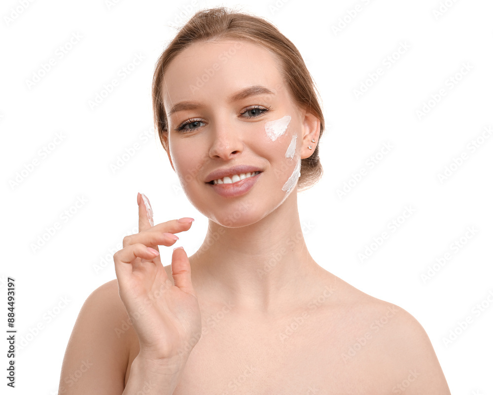 Young woman with cream on her face against white background Young woman with cream on her face against white background