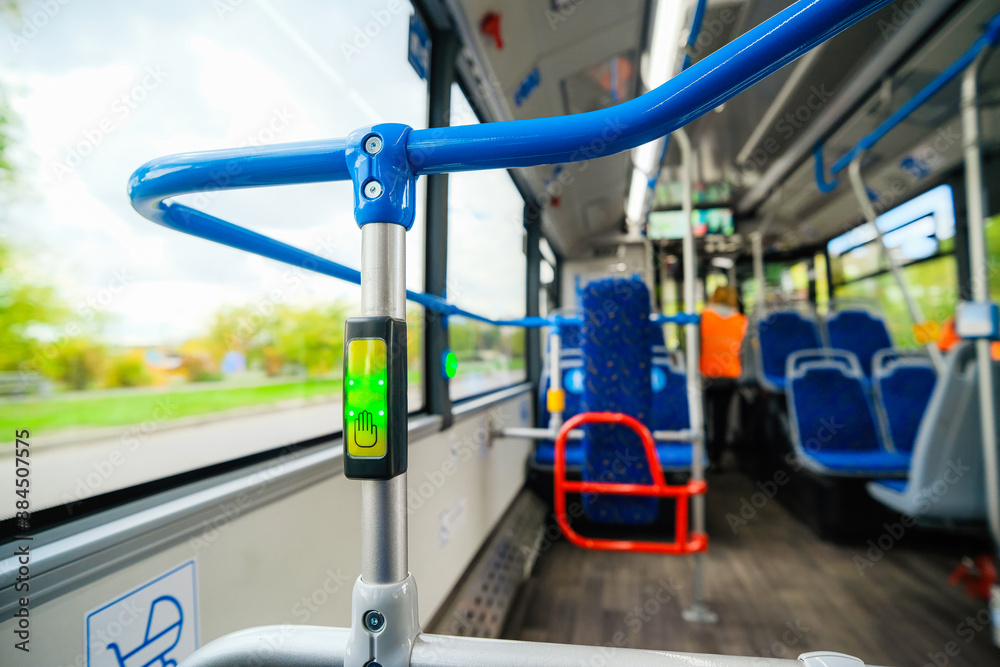 Green button for opening doors in the bus Green button for opening doors in the bus