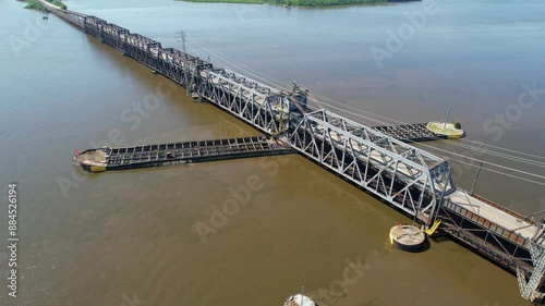 IOWA - 6.24.2024 - Excellent view raising up over a double-decked swinging truss bridge over the Mississippi River. photo