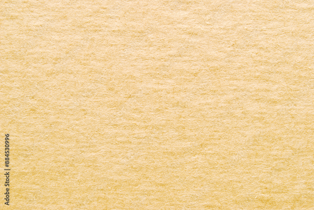 A sheet of creased beige recycled craft paper texture as background A sheet of creased beige recycled craft paper texture as background