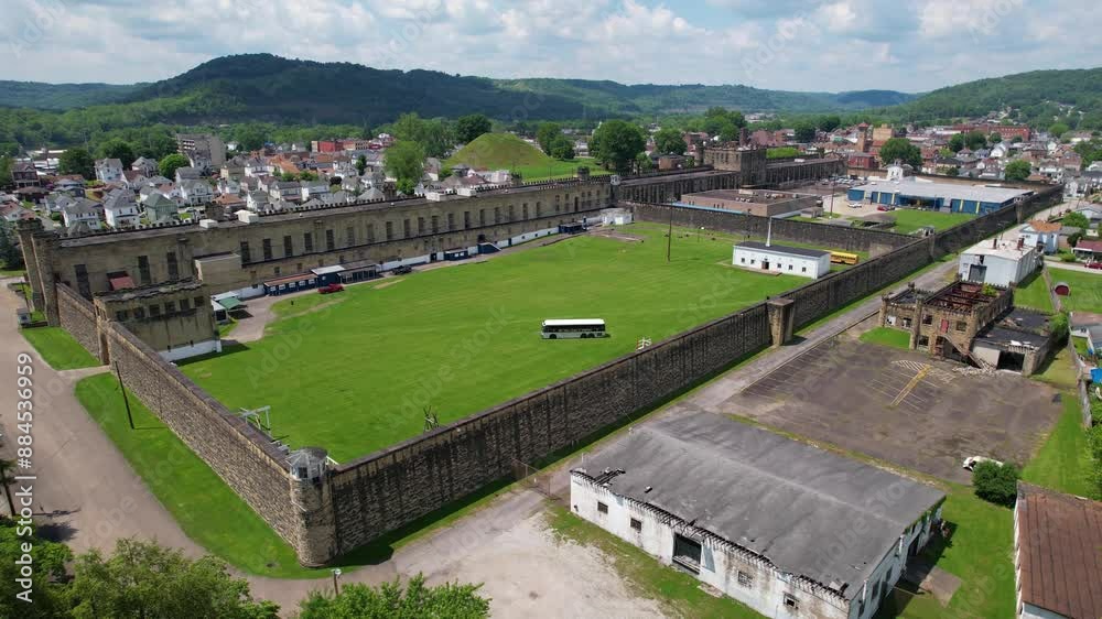 WEST VIRGINIA - 6.28.2024 - Good aerial view circling clockwise around the West Virginia Penitentiary grounds.