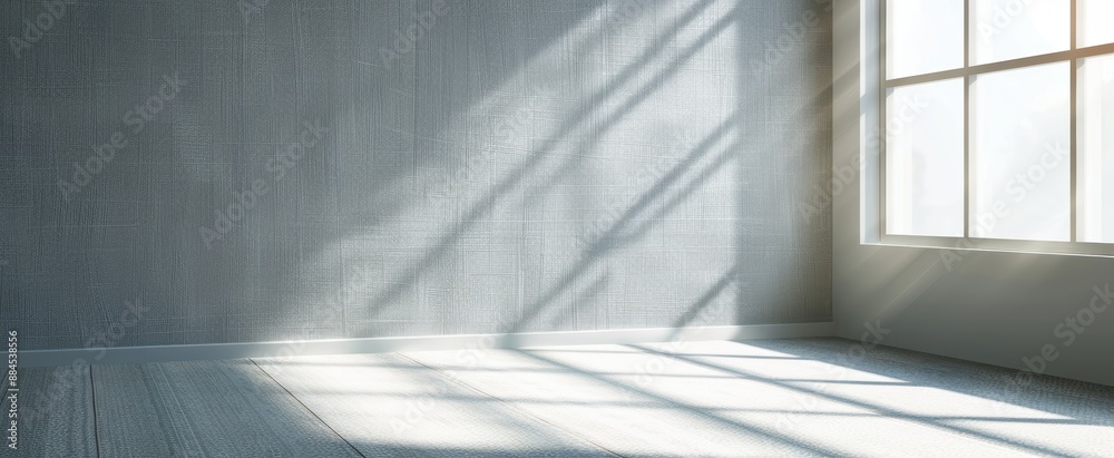 Obraz premium Sunlight streaming through window in empty room