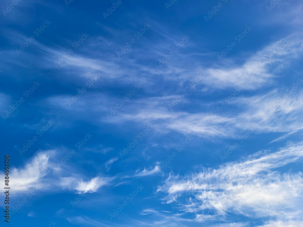 Beautiful blue sky and feathery white clouds nice bright day Beautiful blue sky and feathery white clouds nice bright day