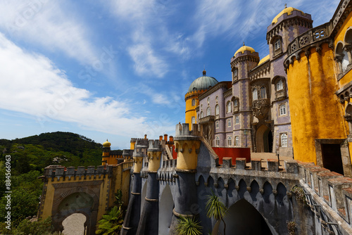 Palace of Pena in Sintra. Lisbon, Portugal. Famous landmark. Summer morning landscape with blue sky.
