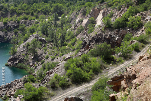 Dirt road through rocks in the mountains