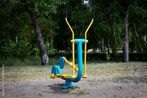 Photography Horizontal color photo, sports equipment, exercise equipment for a healthy lifestyle, on a sunny day on the coast among trees