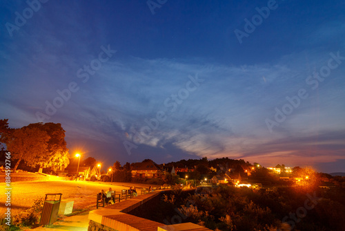 Noctilucent clouds over the skies of Balaton in Tihany near the church. photo