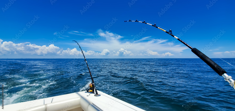 Turquoise Water, Summer in Orange Beach, Alabama, Fishing out of Perdido Pass, passing Bird Island and Robinson Island with Recreational Boaters enjoying the Islands and Sandbars Turquoise Water, Summer in Orange Beach, Alabama, Fishing out of Perdido Pass, passing Bird Island and Robinson Island with Recreational Boaters enjoying the Islands and Sandbars