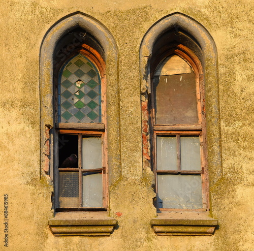 Windows on the old church in Jasa Tomic. photo