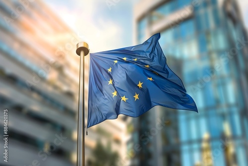 Flag of European Union waving in the wind in front of the modern parliament building on sunny day. Happy Europe day. European Parliament elections. European dream. Future of Europe photo