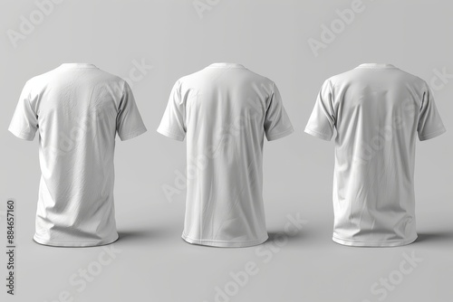 Three plain white shirts with back view. With a gray background.