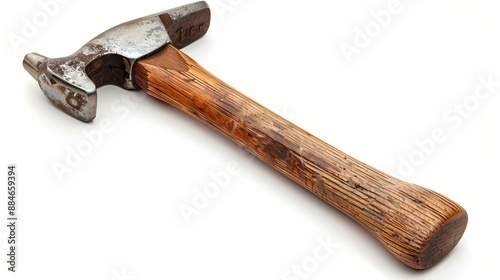 This image features an old hammer with a wooden handle and a worn metal head, showcasing signs of heavy use, craftsmanship, and the passage of time on this essential tool.