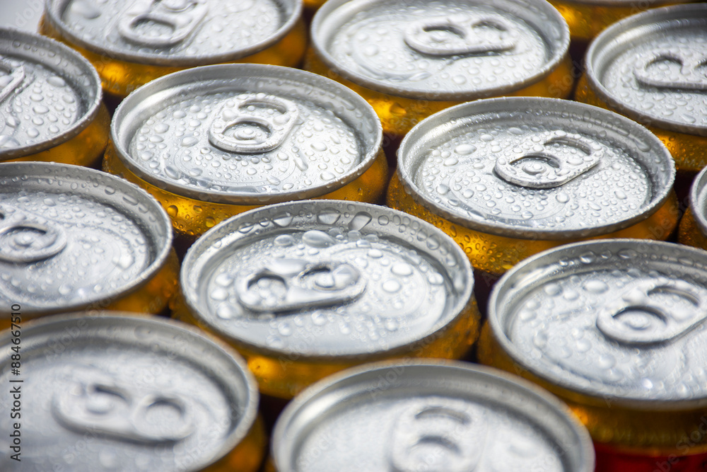 macro photography of wet canned beer lids macro photography of wet canned beer lids