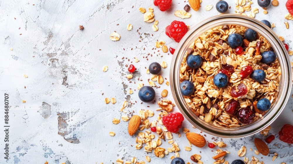 Mixture of oats nuts and berries in a glass jar Homemade granola for vegan breakfast Nutrition concept with space for text Mixture of oats nuts and berries in a glass jar Homemade granola for vegan breakfast Nutrition concept with space for text