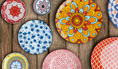 Ceramic plates and bowls, beautiful patterns, bright colors, handmade pieces of art.
