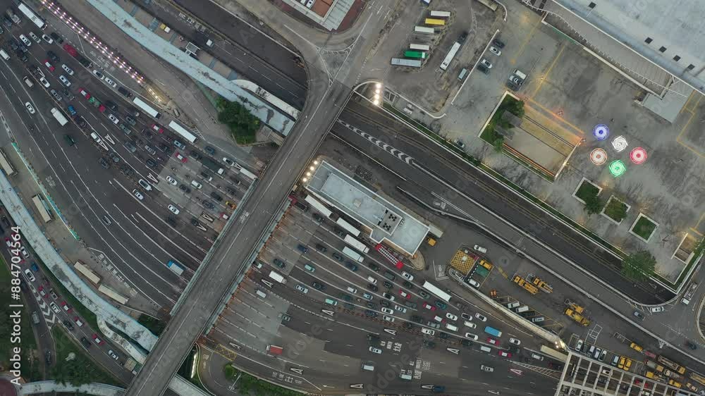 Overhead shot of a busy intersection in Hong Kong, showcasing traffic patterns.