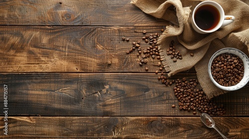 Coffee table with space for text beans and cup on wood background