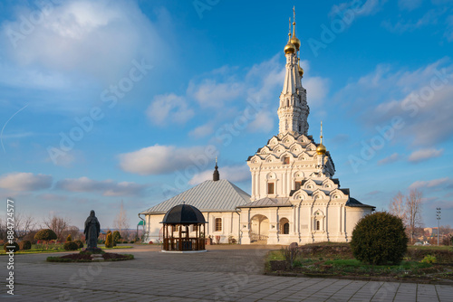 View of the Odigitrievsky Church on the territory of the Vyazma Ioanno-Predtechensky Monastery on a sunny evening with clouds, Vyazma, Smolensk region, Russia photo