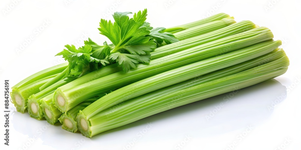 Fresh green celery stalks on a white background, celery, vegetable, green, fresh, healthy, organic, food, diet, raw Fresh green celery stalks on a white background, celery, vegetable, green, fresh, healthy, organic, food, diet, raw