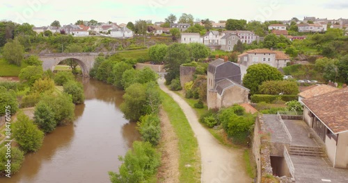 Pan shot Ancient fortified medieval town Parthenay, France. photo