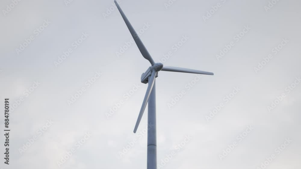Closeup short of Wind Turbine Eco green Energy during a Overcast sky producing clean sustainable energy, green energy revolution. 3D animation. Closeup short of Wind Turbine Eco green Energy during a Overcast sky producing clean sustainable energy, green energy revolution. 3D animation.